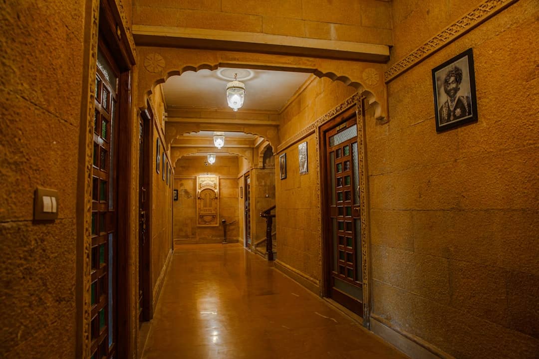 a long hallway with a clock on the wall