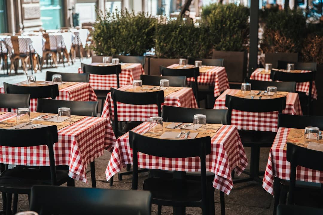 a restaurant with red and white checkered tablecloths