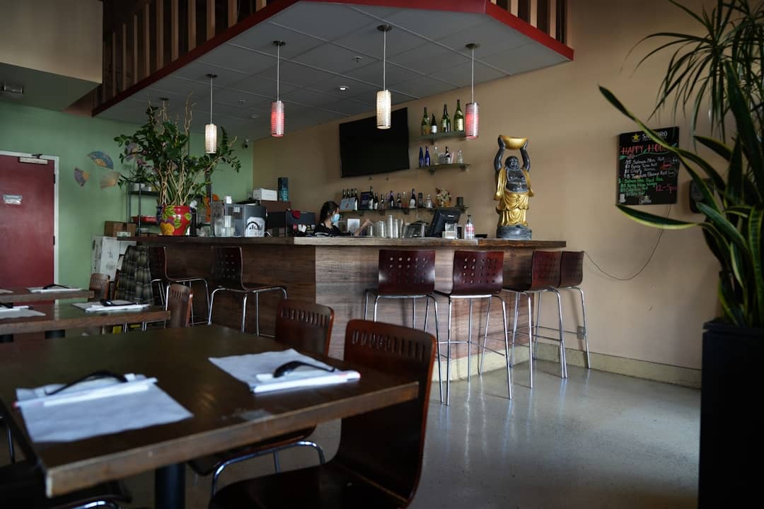 Interior of a restaurant with a bar and tables
