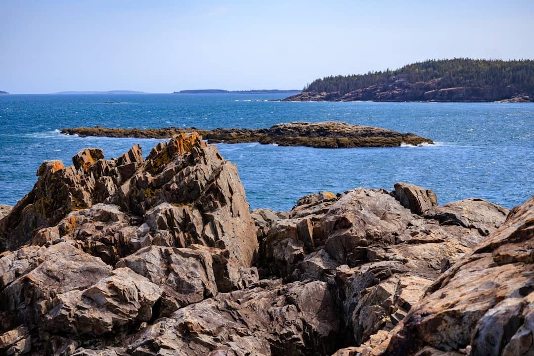 a large body of water surrounded by rocks