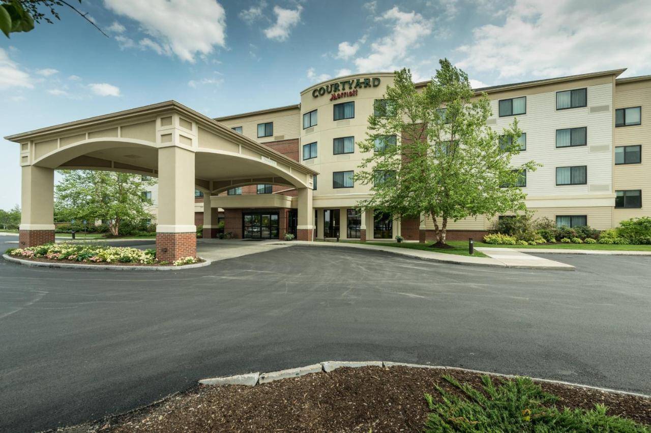 a rendering of a hotel with a parking lot at Courtyard Bangor in Bangor
