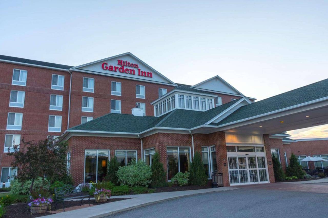 a hotel garden inn with a sign on top of it at Hilton Garden Inn Bangor in Bangor