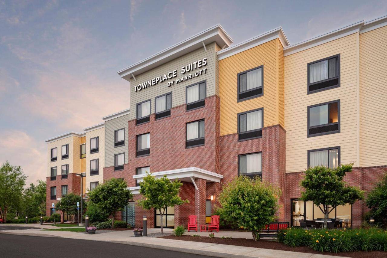 an artist rendering of the building planned for the university sites apartments at TownePlace Suites Bangor in Bangor