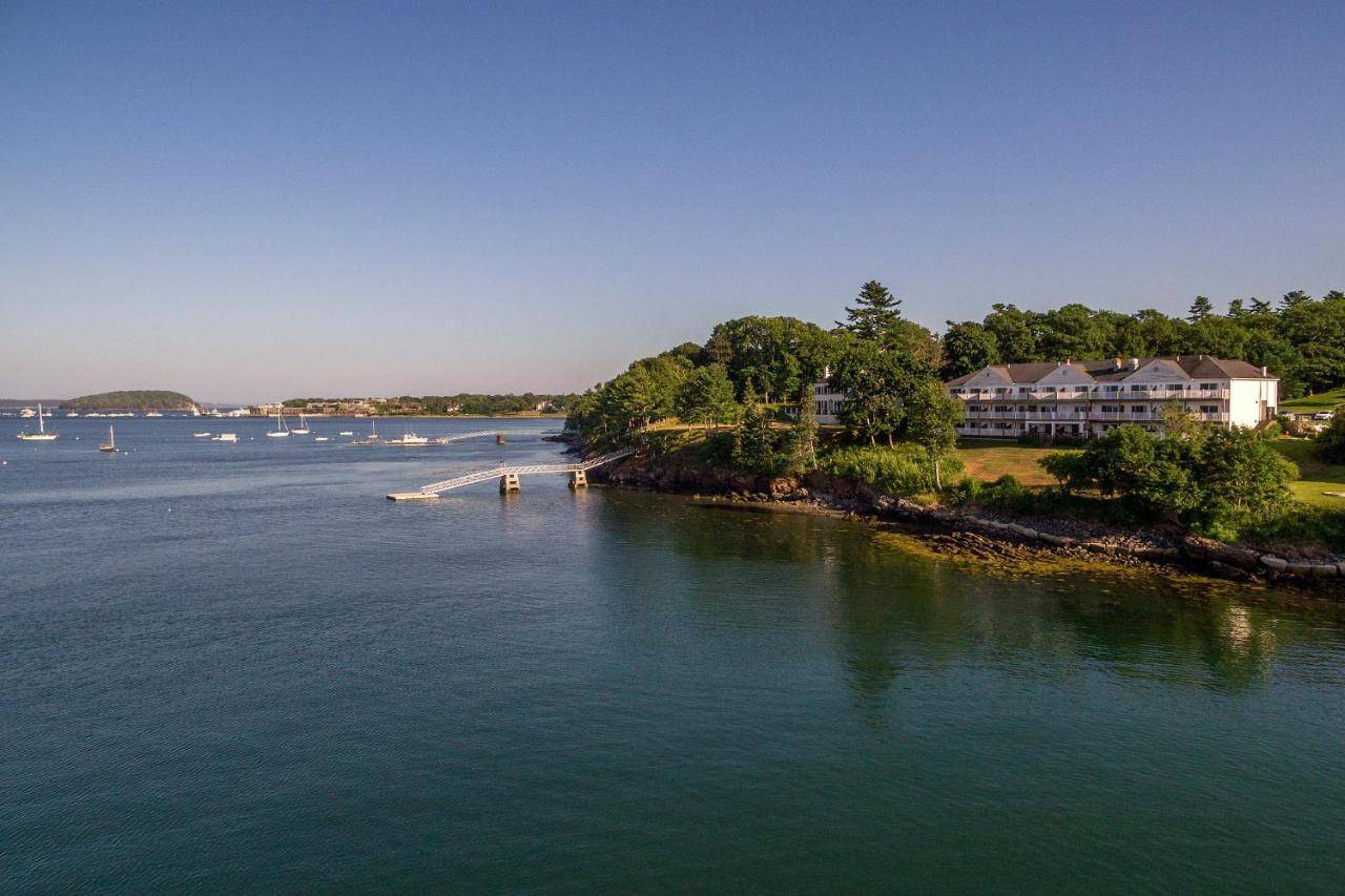an aerial view of a lake with boats in the water at Bayview Hotel in Bar Harbor