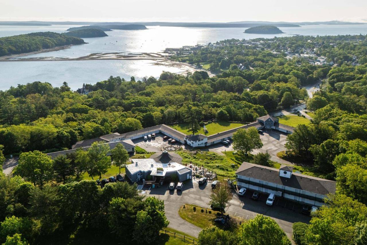an aerial view of the house and the lake at Wonder View Inn - Bar Harbor Collection in Bar Harbor