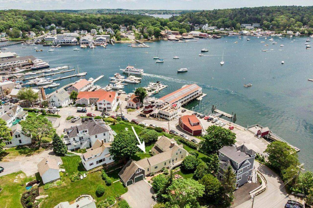 an aerial view of a harbor with boats in the water at Boothbay Lookout in Boothbay Harbor
