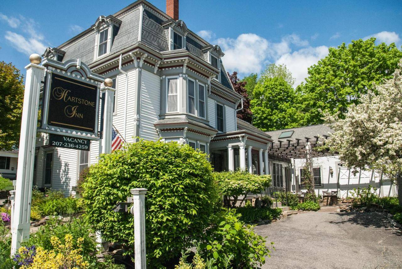 a large house with a sign in front of it at Hartstone Inn in Camden