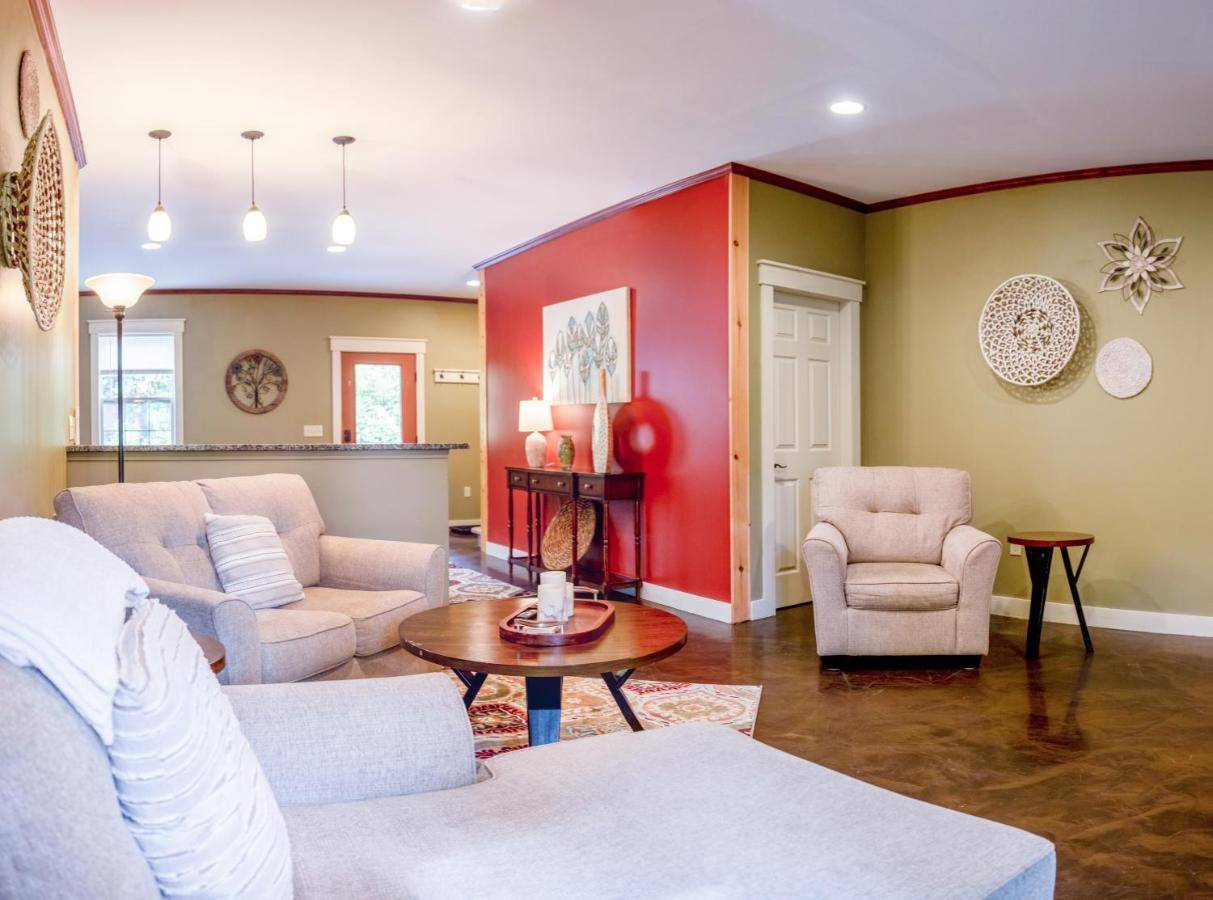 a living room with two couches and a table at House close to Acadia National Park in Ellsworth