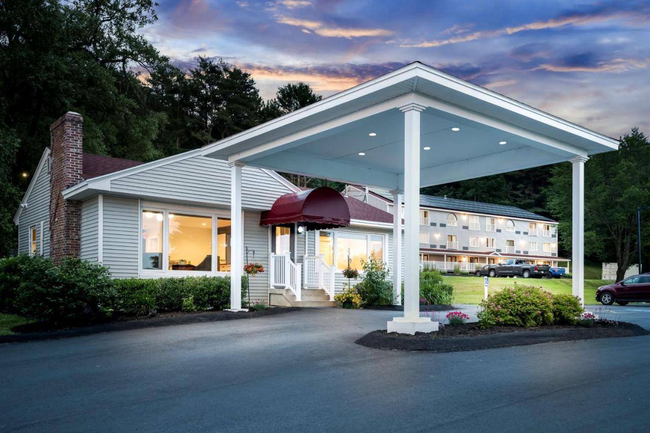 a building with a pavilion in front of a building at Best Western - Freeport Inn in Freeport