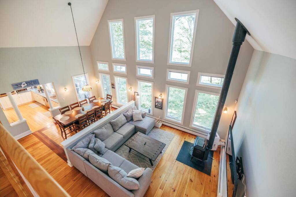 an overhead view of a living room and dining room at Waterfront, Luxury, Spacious home in Freeport! in Freeport