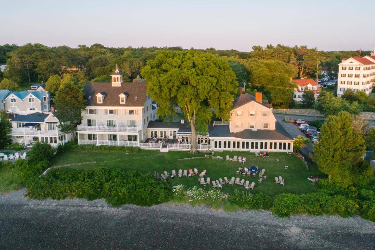 an aerial view of a house with a group of people on a lawn at Breakwater Inn in Kennebunkport
