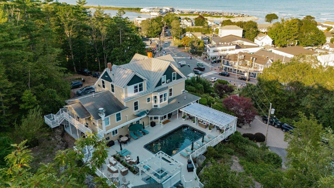 an overhead view of a large house with a swimming pool at The Trident Inn in Ogunquit