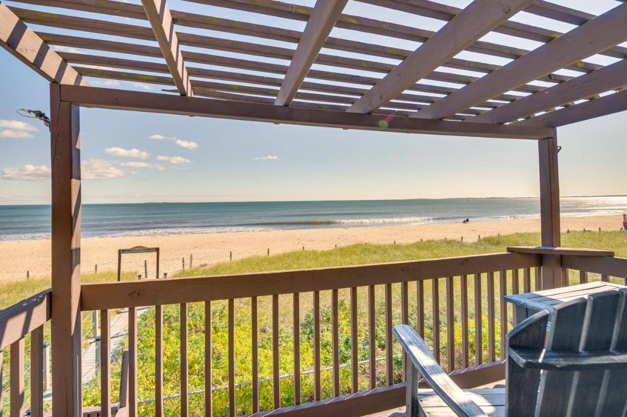 a balcony with a view of the beach at Beachfront 12 Condo on Old Orchard Beach in Old Orchard Beach