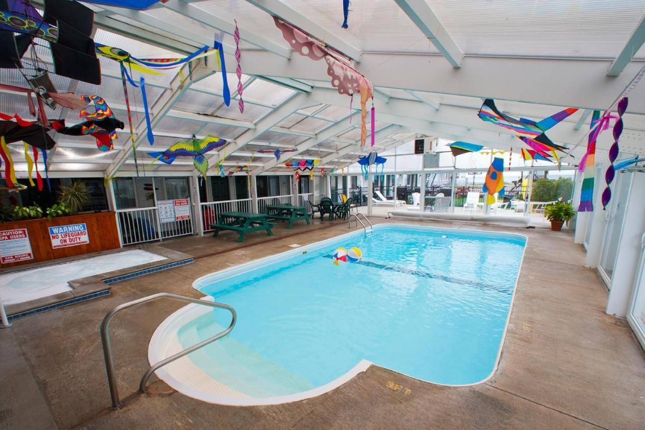 a large swimming pool in a building at Crest Motel in Old Orchard Beach