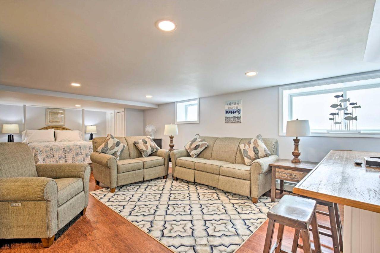 a living room with two couches and a bed at Old Orchard Beach Home with Patio Walk to Beach in Old Orchard Beach