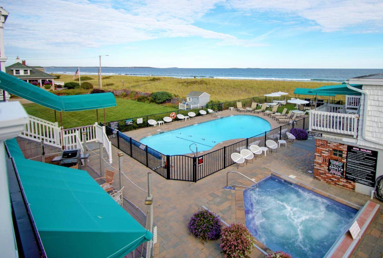 an overhead view of a swimming pool and the ocean at Sea Cliff House Motel in Old Orchard Beach