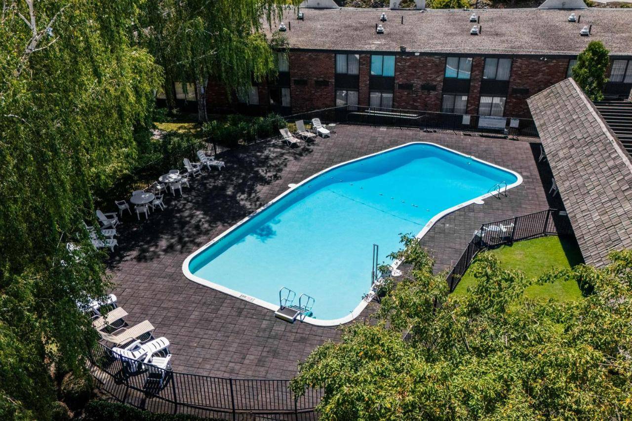 an overhead view of a swimming pool in a yard at Fireside Inn & Suites Portland in Portland