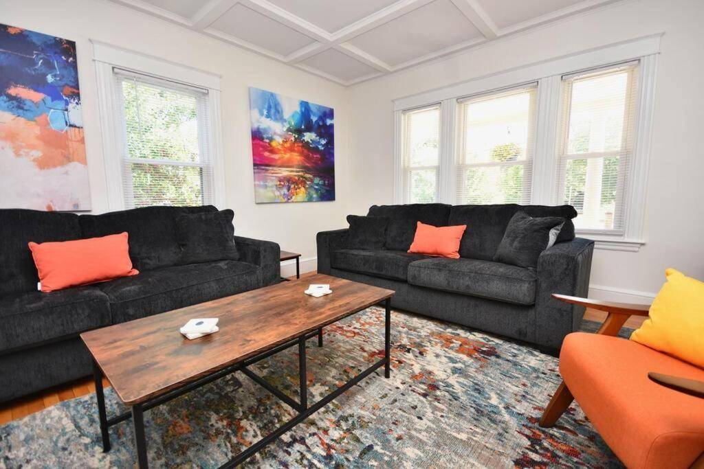 a living room with two couches and a coffee table at Good Vibes Portland Home - 4 Wonderful Seasons in Portland
