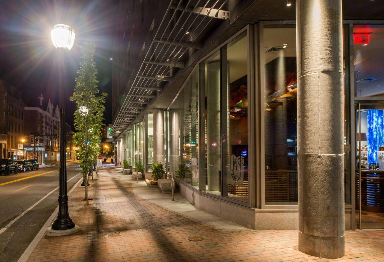 a street light on a sidewalk in front of a building at Hyatt Place Portland Downtown - Old Port Square in Portland