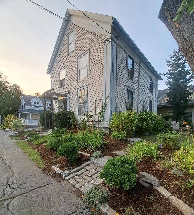 a house with a garden in front of it at Captain Hugo's Guesthouse in Rockland