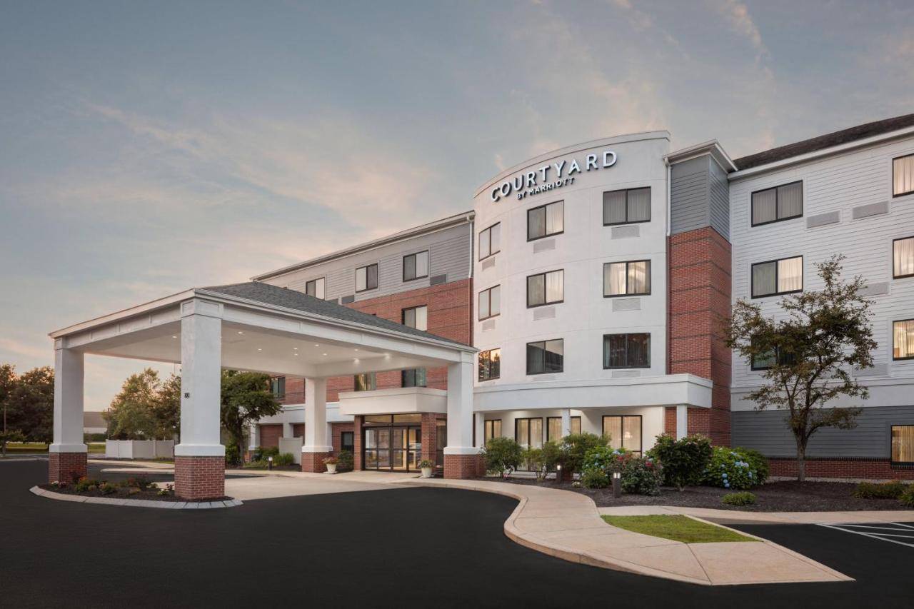 a rendering of the front of a hotel at Courtyard Portland Airport in South Portland