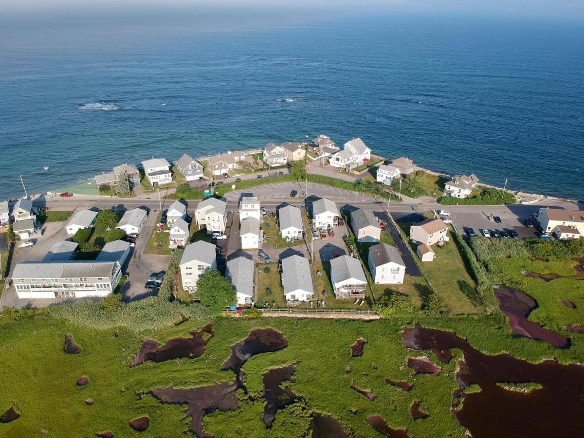 an aerial view of a resort near the ocean at Moody's Motel and Cottages in Wells