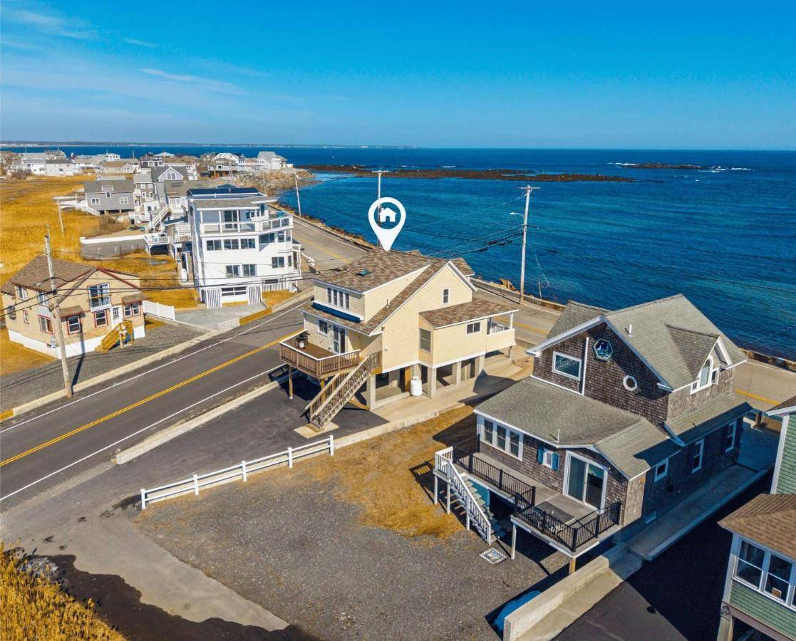 an aerial view of houses and the ocean at Oceanfront - Front Porch - Back Deck - Kitchen in Wells