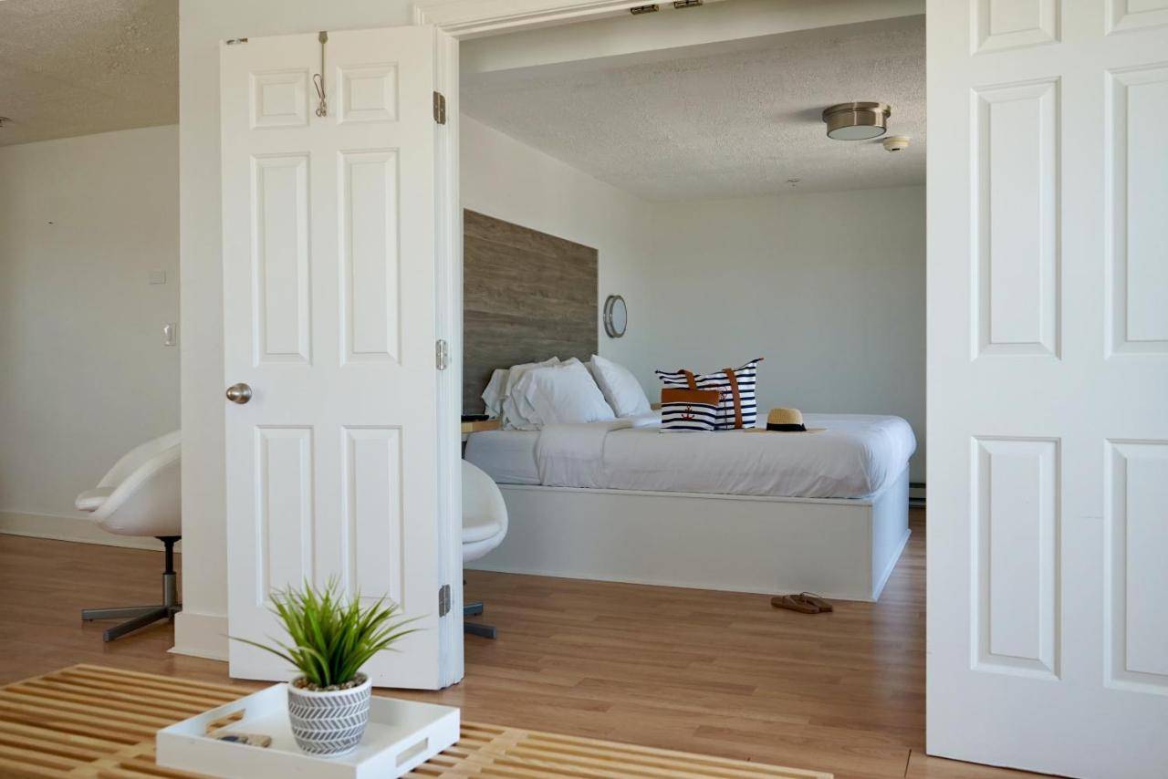 a bedroom with a bed and a white door at Inn on the Blues in York