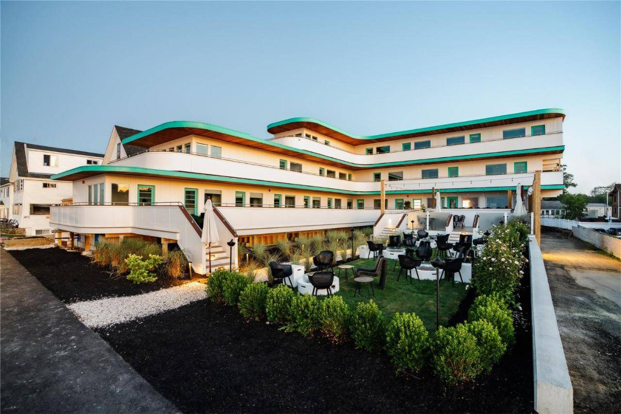 an aerial view of a building with chairs and tables at The Nevada in York